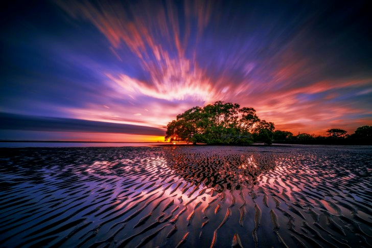 Zonsopgang aan de kust