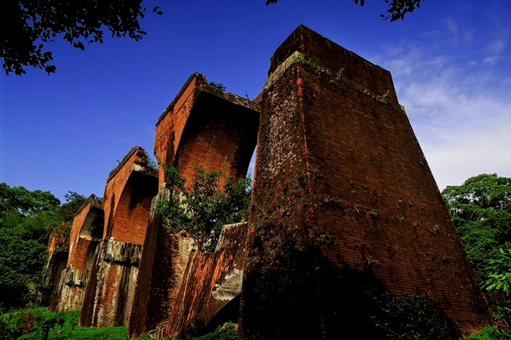 Low Angle Brown Concrete Building at Daytime