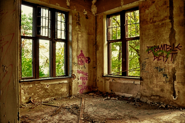 Brown Concrete Room With Windows during Daytime