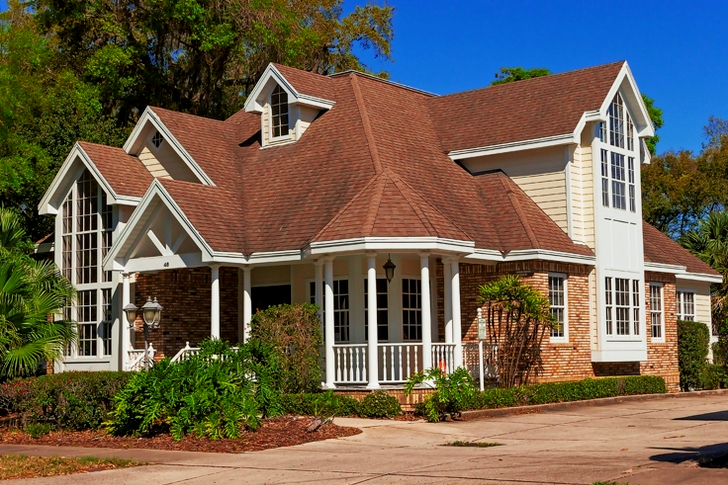 Brown and White House Beside Trees