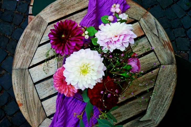 White, Pink, and Purple Flowers on Table