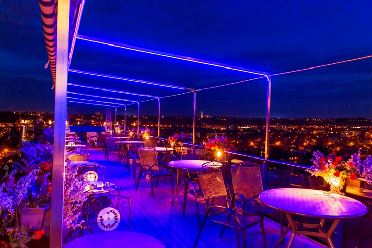 Round Gray Table With Two Chairs