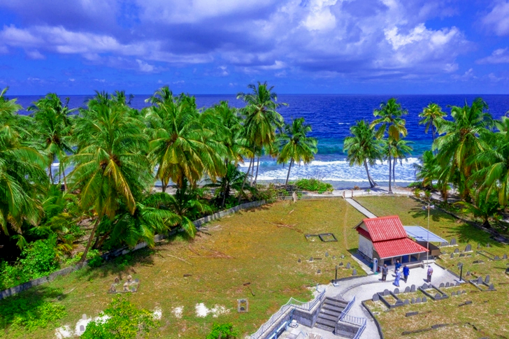 White and Red House Near Sea