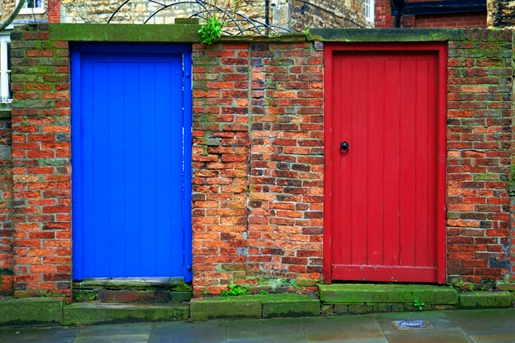Closed Blue and Red Wooden Doors
