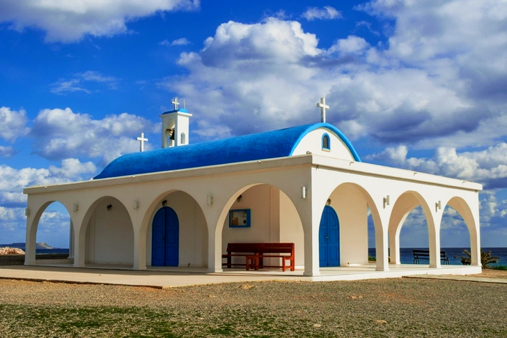 White and Blue Painted Church Under Blue Sky