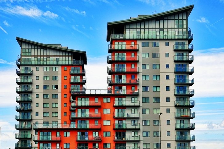Gray, Red, and Orange Concrete Building