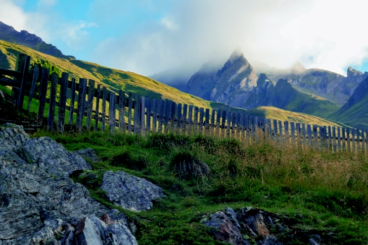 Brown Wooden Fence Beside Mountain