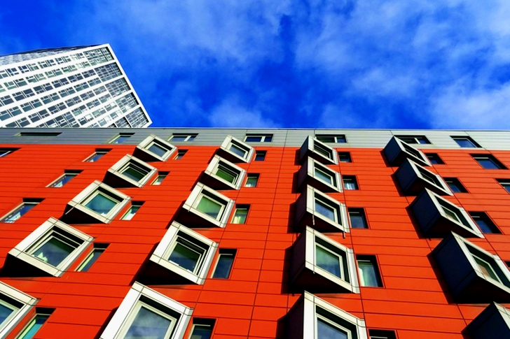Brown and Gray Concrete Building Under Clear Blue Sky
