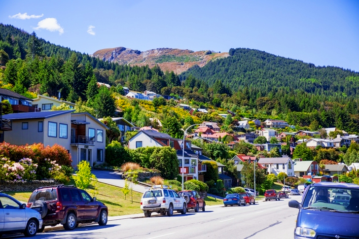 Cars Parked Beside Mountains