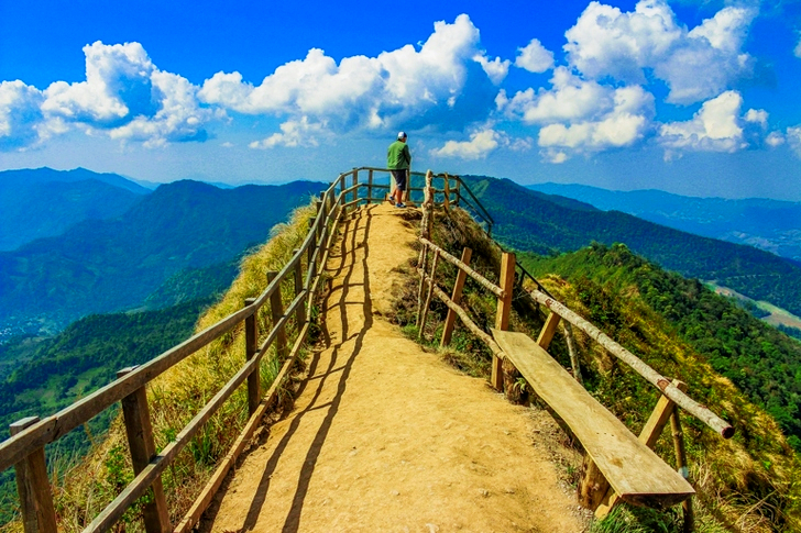 a Man Standing in the Cliff