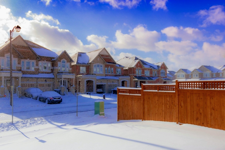 Brown 2-storey Houses during Snow