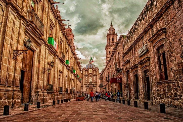 Mexico Flag on Brown 2-storey Building