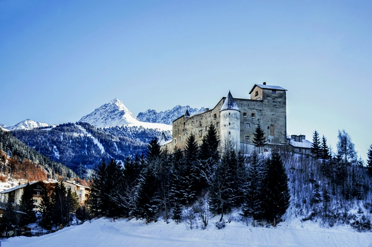 Gray Concrete Building on Snow Field
