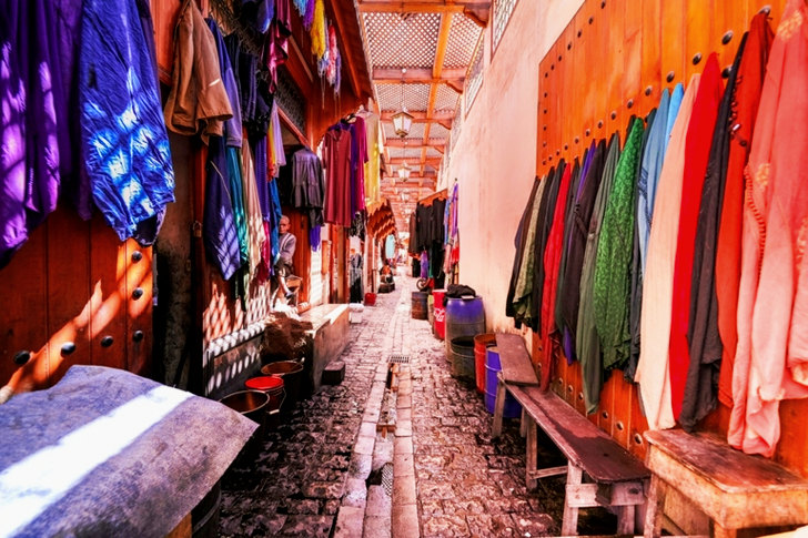 Assorted-color Clothes Hanged on Wall