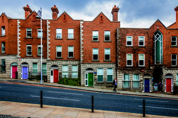 Brown Buildings Beside Road