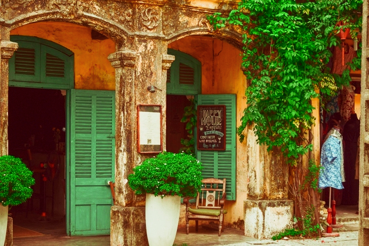 Building With Green Opened Doors and Windows