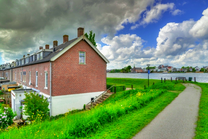 Brown House Near Body of Water