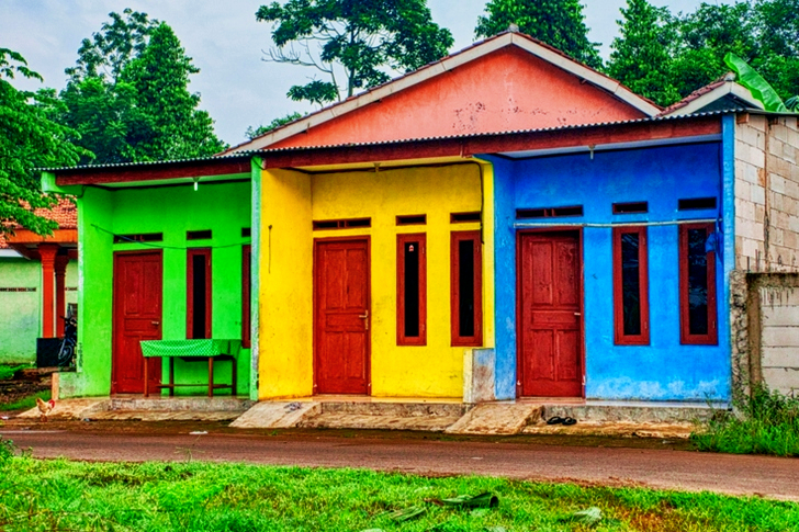 Green, Yellow, and Blue Apartment Building