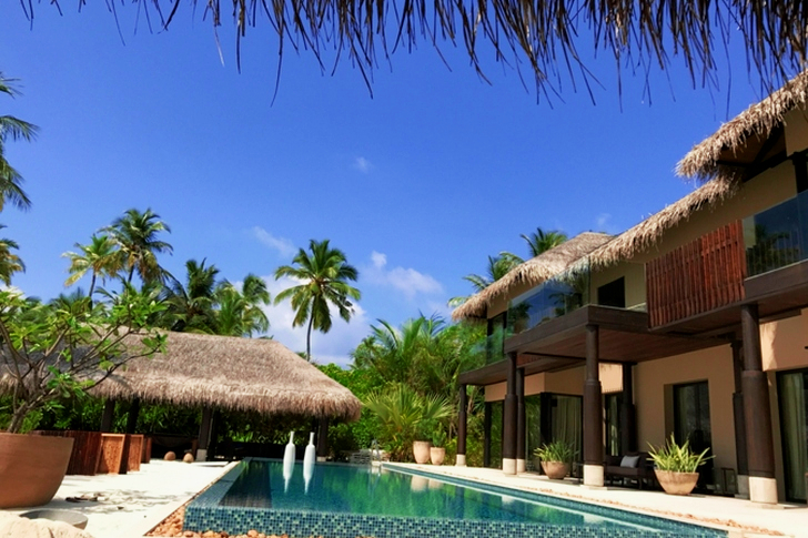 Brown and White Concrete 2-storey House Near Swimming Pool