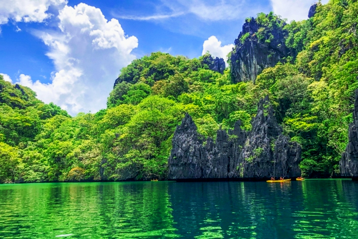 Body of Water Under White and Blue Sky