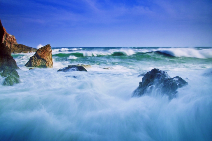 Rock Formation Near Body of Water