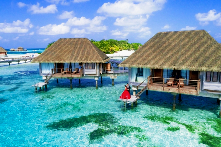 Man And Woman Standing On Deck
