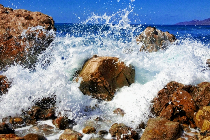 Seascape Waves Hitting the Rocks