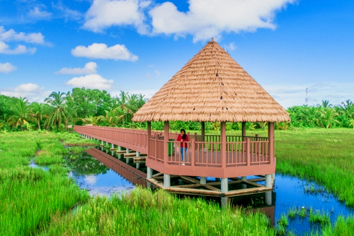 Brown Gazebo on Body of Water